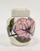 Moorcroft ginger jar and cover decorated with magnolia pattern reserved against a cream ground,