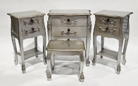 Set of contemporary French-style furniture with a silvered finish comprising a chest with shaped top