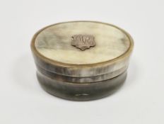 Horn and silver-mounted oval snuff or pill box, circa 1900, the cover applied with a silver shield-