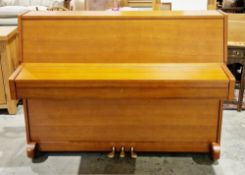Contemporary Waldstein upright piano in a golden oak case, probably model no.UP108, on castors,