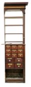 Victorian mahogany shop apothecary end cabinet, the moulded cornice (cut to one side) over an