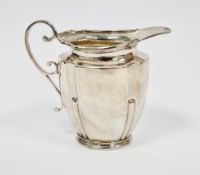 George V silver milk jug, Sheffield 1919, maker's mark rubbed, of oval fluted form, double c-