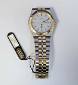 Gent's Seiko stainless steel and gilt metal wristwatch having baton numerals, calendar aperture,