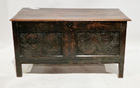 17th/18th century oak coffer, the hinged rectangular two-plank top with thumbmould edge, over two