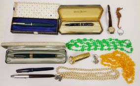 Two cased Parker fountain pens, another Parker fountain pen, Conway Stewart propelling pencil and