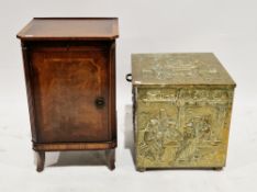 Early 20th century oak coal box with a brass covering, having relief decoration of tavern scenes,