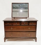 Stag Minstrel mahogany dressing chest with rectangular adjustable mirror over an arrangement of four