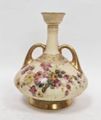 Royal Worcester blush-ivory ground two-handled bottle vase, of squat form, circa 1895, printed