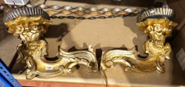 Pair of large carved giltwood wall lights, each having a crimped metal sconce on a flower shaped