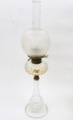 Late 19th/early 20th century oil lamp having globular opaque etched glass shade, cut glass clear