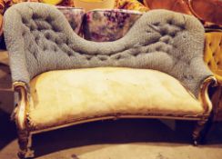 Victorian scroll end settee with double arched button back, inverted curved front, gilt and cream