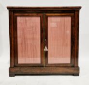 Regency rosewood dwarf library bookcase/chiffonier, the rectangular top with rounded corners, over