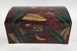South East Asian red lacquered dome topped blanket box decorated with butterflies and leaves, having