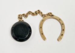 9ct yellow gold watch chain set with a horseshoe to one end (engraved with a name and address) and