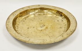 German or Dutch brass charger, 18th century, of deep form with broad rim (small hole to rim), 37