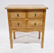 Contemporary pale oak side cabinet comprising four short drawers with knob metal handles, on