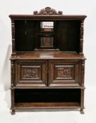 Victorian mirror-back sideboard in the Jacobean manner, the gadrooned pediment surmounted by a