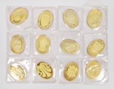 Set of twelve Danbury Mint ' Arms of the Prince & Princess of Wales ' silver gilt oval ingots,