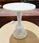 Small white marble circular stand on a turned baluster column and circular foot, 36cm high x 30cm