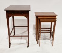 Nest of three mahogany tables with chequered inlaid borders, on square tapering legs, largest 61cm