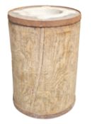 19th century large iron bound apothecary pestle and mortar, the stone mortar held on a turned elm