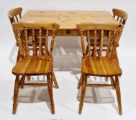 Modern pine dining room table, the rectangular top with rounded corners, on turned baluster legs,