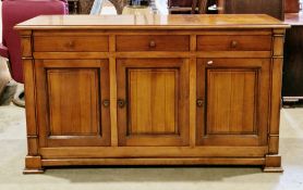 Contemporary MultiYork cherrywood sideboard comprising three frieze drawers with metal knob handles,