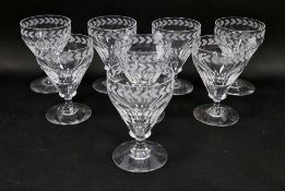 Eight cut and engraved Mappin & Webb rummers, in the Regency style, engraved with a band of laurel