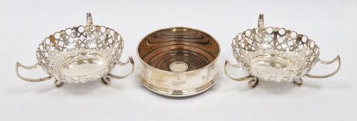 Silver and mahogany wine bottle coaster, London 1993, David R Mills, of plain cylindrical form