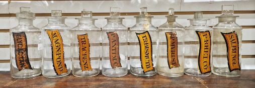 Eight various late 19th/early 20th century labelled glass apothecary bottles and stoppers, each of