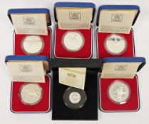 Five cased Royal Mint sterling silver proof crowns commemorating Queen Elizabeth II silver jubilee