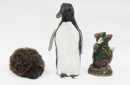Early to mid-20th century black and white leather doorstop in the form of a penguin, stamped '