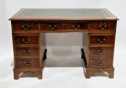 Mahogany twin-pedestal writing desk in the George III manner, the rectangular top with green leather