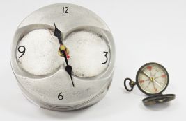 Aerotiques metal clock of circular form, formed from a piston of an aeroplane, battery operated, the