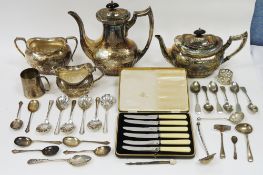 Silver plate four-piece tea service, the teapot and coffee pot with ebony finials, having engraved