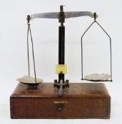 Set of early 20th century mahogany chemist's scales by Dakin Bros Ltd, with brass and black metal