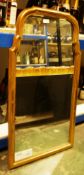 20th century mirror having a gilt-effect moulded frame with shaped top, 93cm x 49.5cm