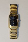 Gent's Rotary gold-plated bracelet watch, the rectangular black dial with date aperture