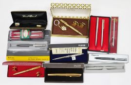 Collection of pens including a cased Parker gold tone cased fountain pen, a cased Parker ballpoint