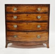 Early 19th century mahogany bowfronted chest comprising three long graduated cockbeaded drawers with