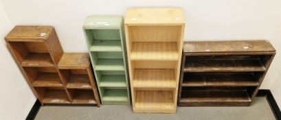 Two early to mid-century painted wooden bookcases, largest 110cm high x 44cm wide x 23cm deep, an