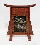Japanese red lacquered firescreen, the front with black panel, with a painted scene of figures
