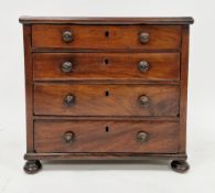 19th century mahogany apprentice piece table-top chest of drawers with four graduated drawers having