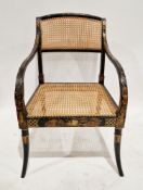 Regency elbow chair with chinoiserie decoration on a black ground, bergere cane back panel and seat,