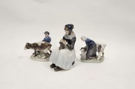 Royal Copenhagen porcelain figure of The Knitter, shape no. 1317, a figure of a Girl Feeding a Calf,