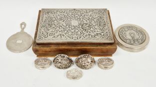 Three silver 925 pill boxes of oval form, the lids having embossed decoration of putti, 4cm long,