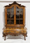 Walnut vitrine cabinet on chest in the 18th century Dutch manner, with shell carved and shaped