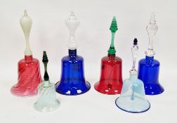 Six Victorian coloured glass handbells, including two with Bristol Blue bell, one with opaque