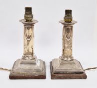 Pair of silver weighted candlesticks, converted to electric, Sheffield 1906, Thomas A Scott,