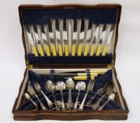 Early 20th century walnut cased canteen of silver plated cutlery by Ryals, Art Deco Grecian